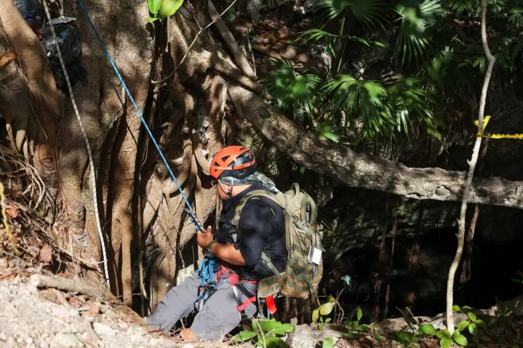 Man goes down to clean Cenote