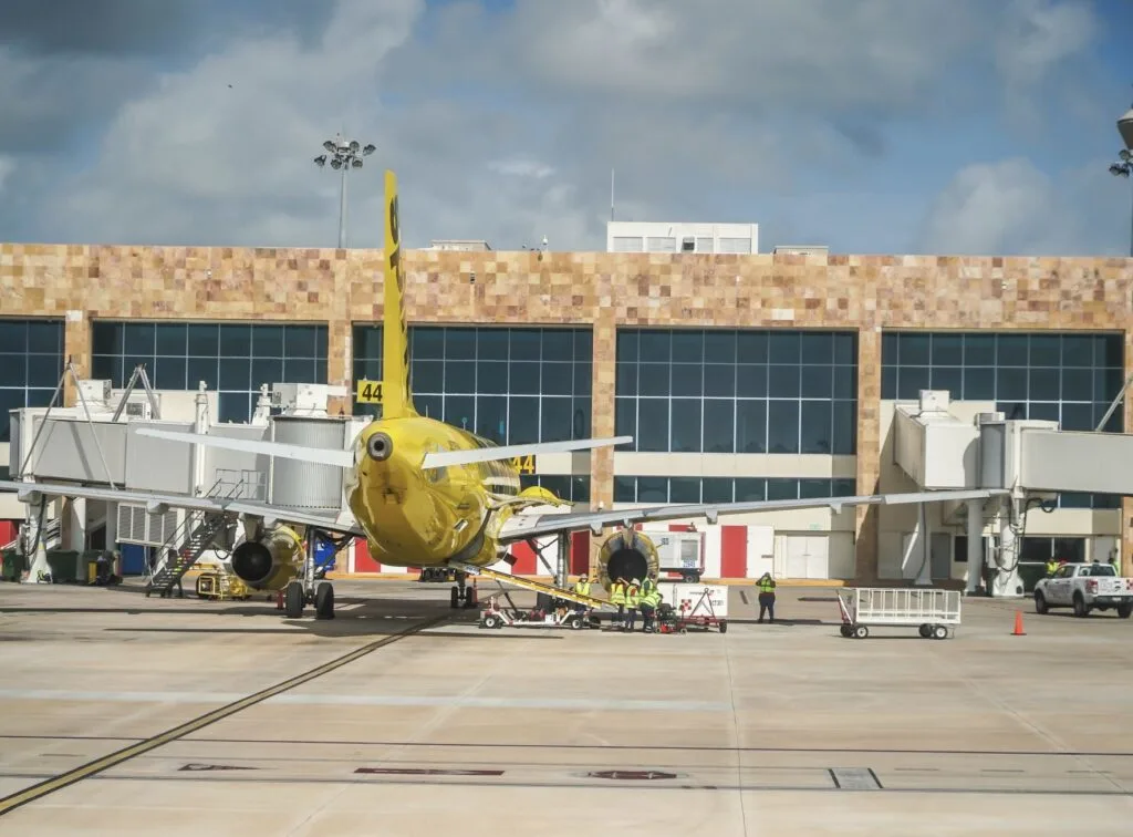 Planes at gates at Cancun Airport