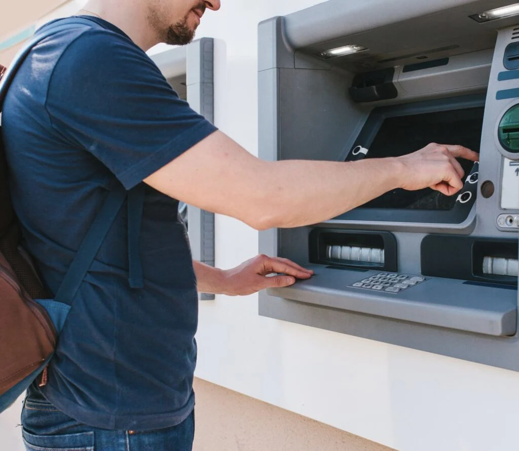 Tourist at ATM