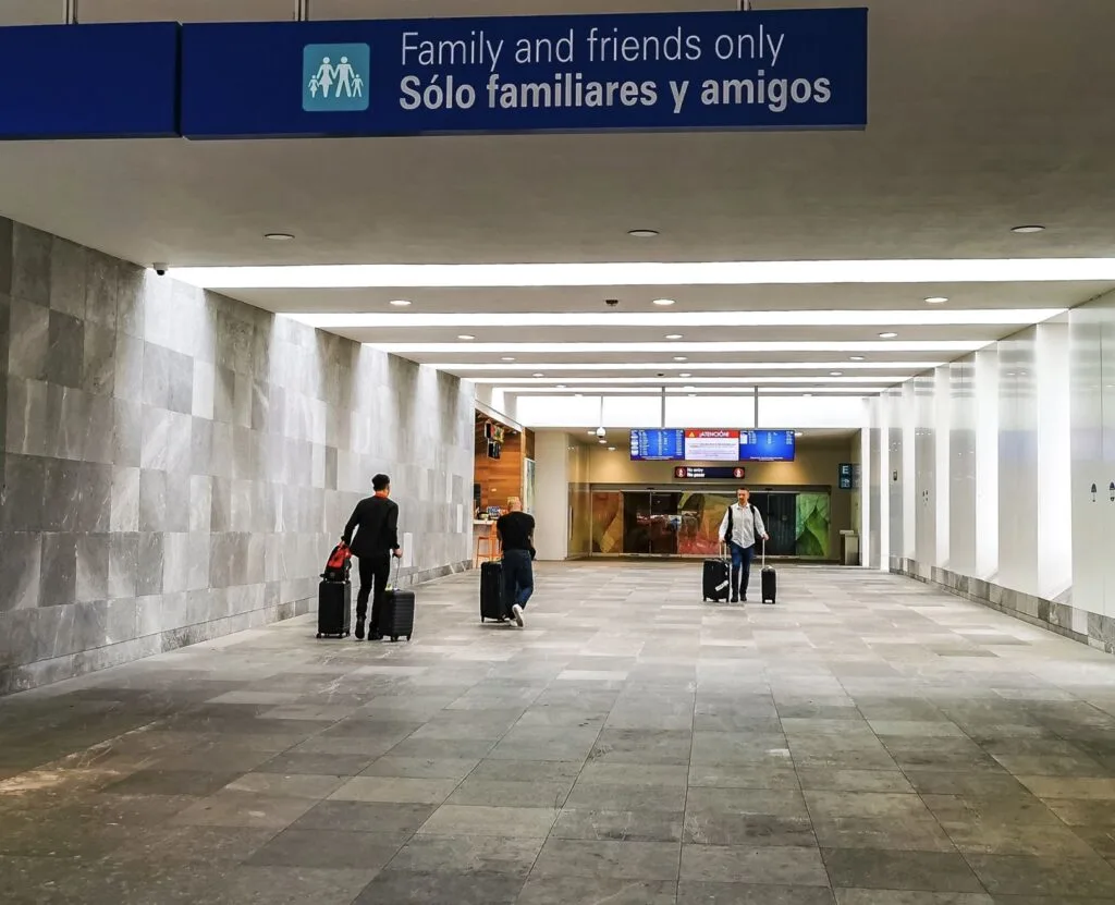 Tourist walking out of Cancun airport