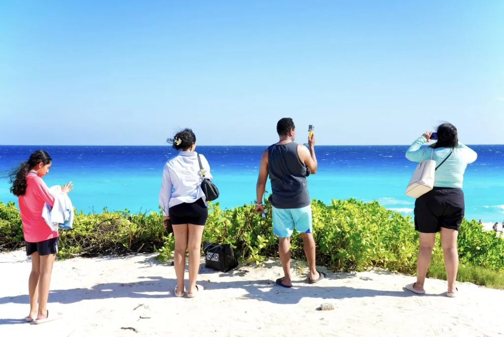 Tourists in Cancun take photos