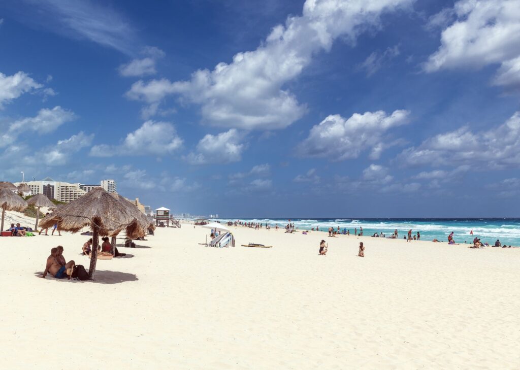 Tourists on Dolphin beach in Cancun, Yucatan peninsula
