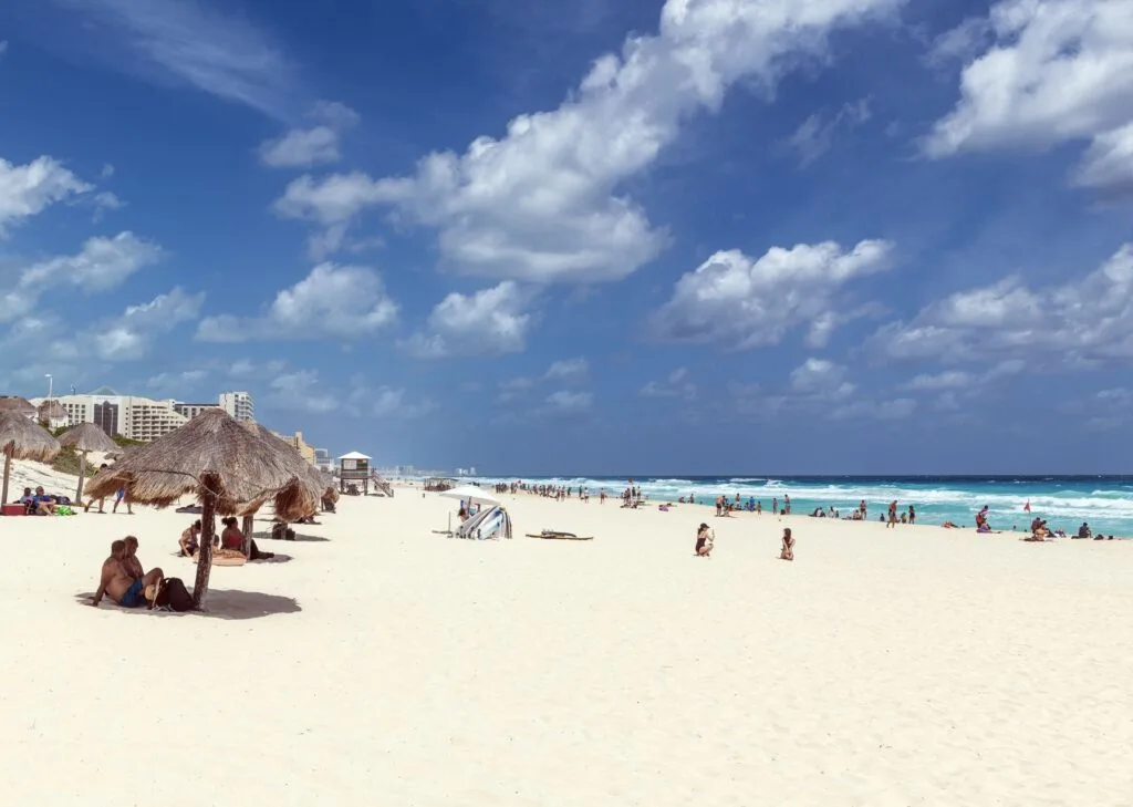 Tourists on Dolphin beach in Cancun, Yucatan peninsula