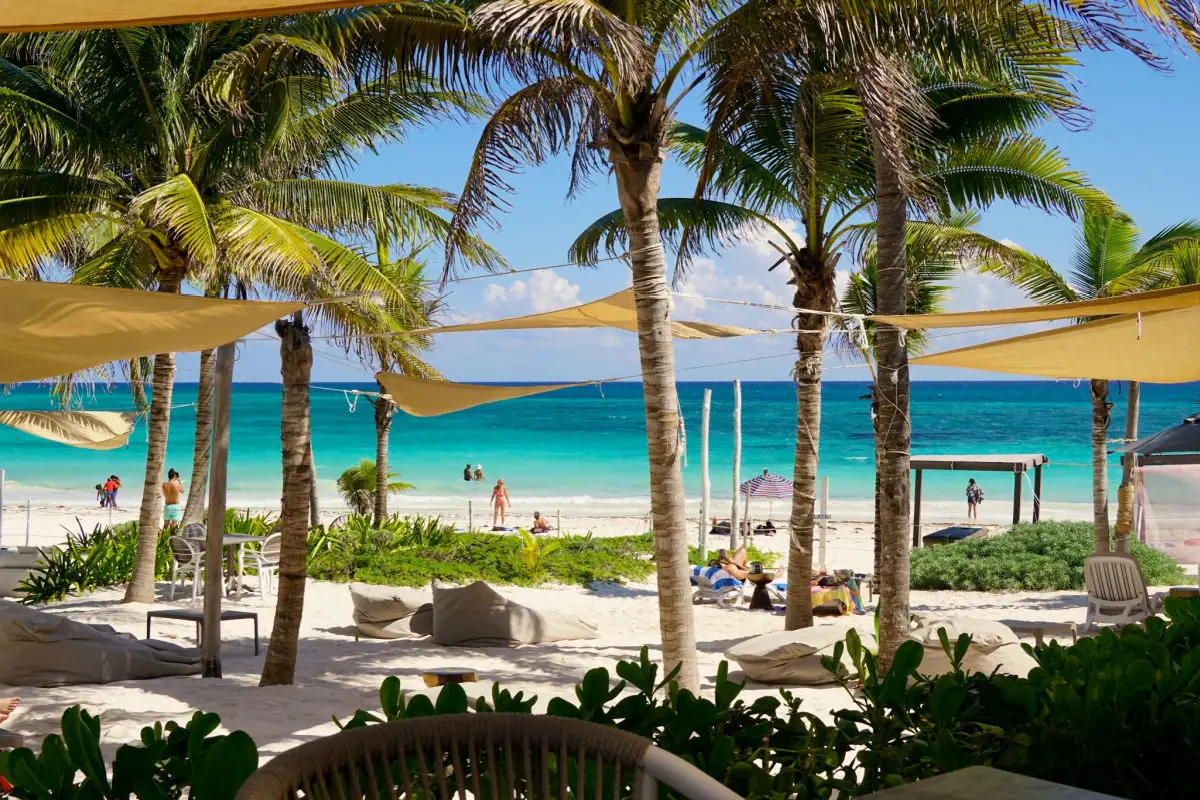 Xpu Ha Beach, Mexico - Warm turquoise waters of the Caribbean Sea wash up on the white sand beaches of the Xpu Ha seaside resorts in the Mayan Riviera region of Mexico's Yucatan peninsula.