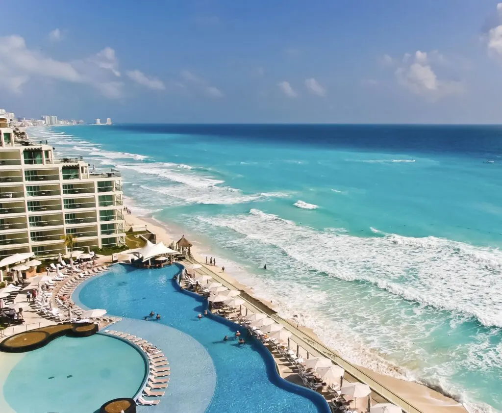 Cancun pool loungers ocean front