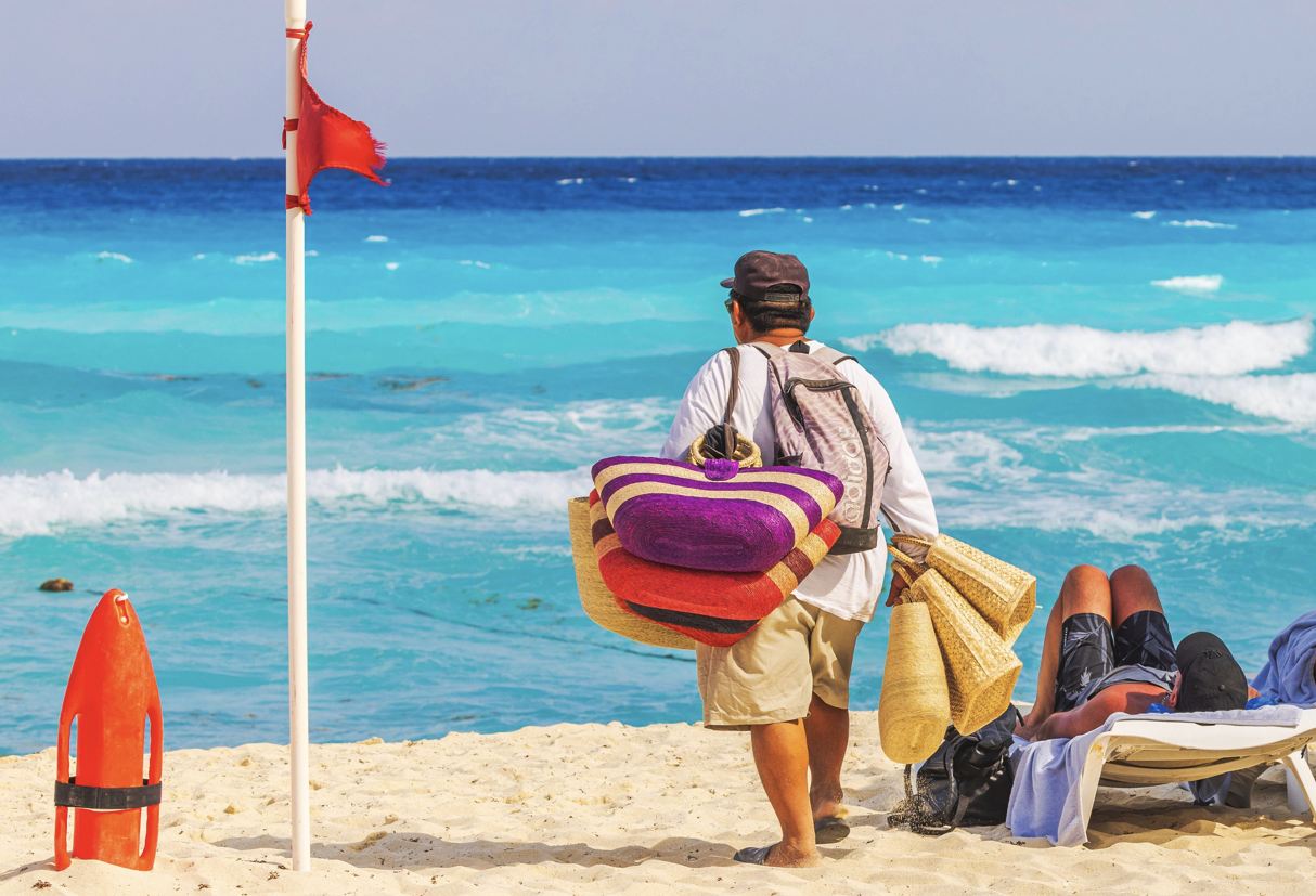 Pesos versus dólares en Cancún cuando se usa USD realmente le está costando más dinero