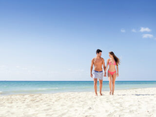 Couple walking on the beach