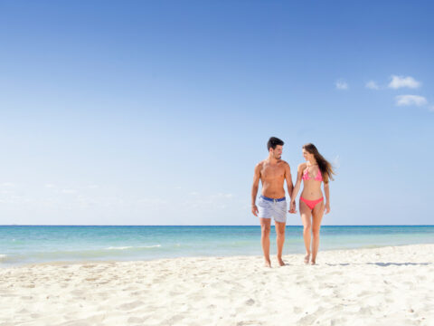Couple walking on the beach