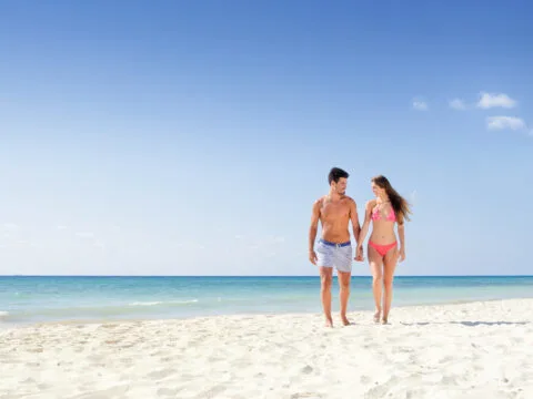 Couple walking on the beach