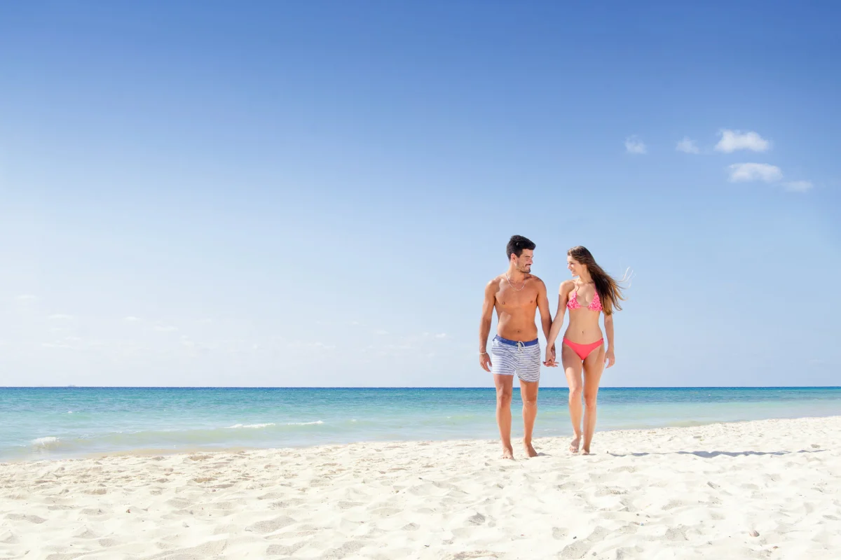 Couple walking on the beach