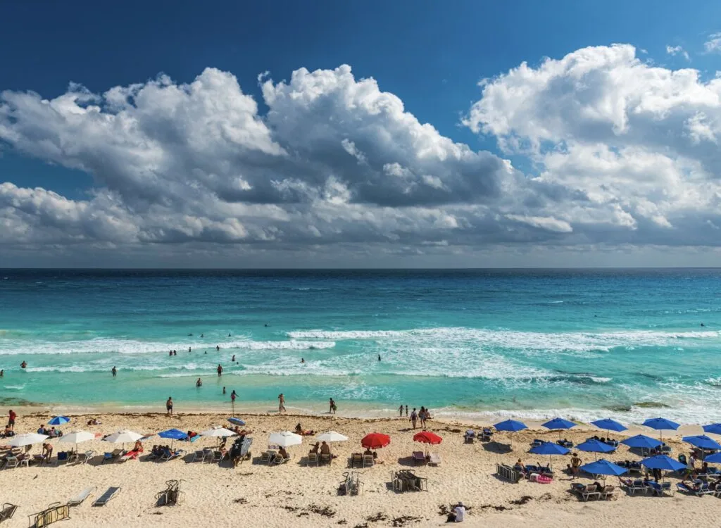 Cancun busy beach tourists
