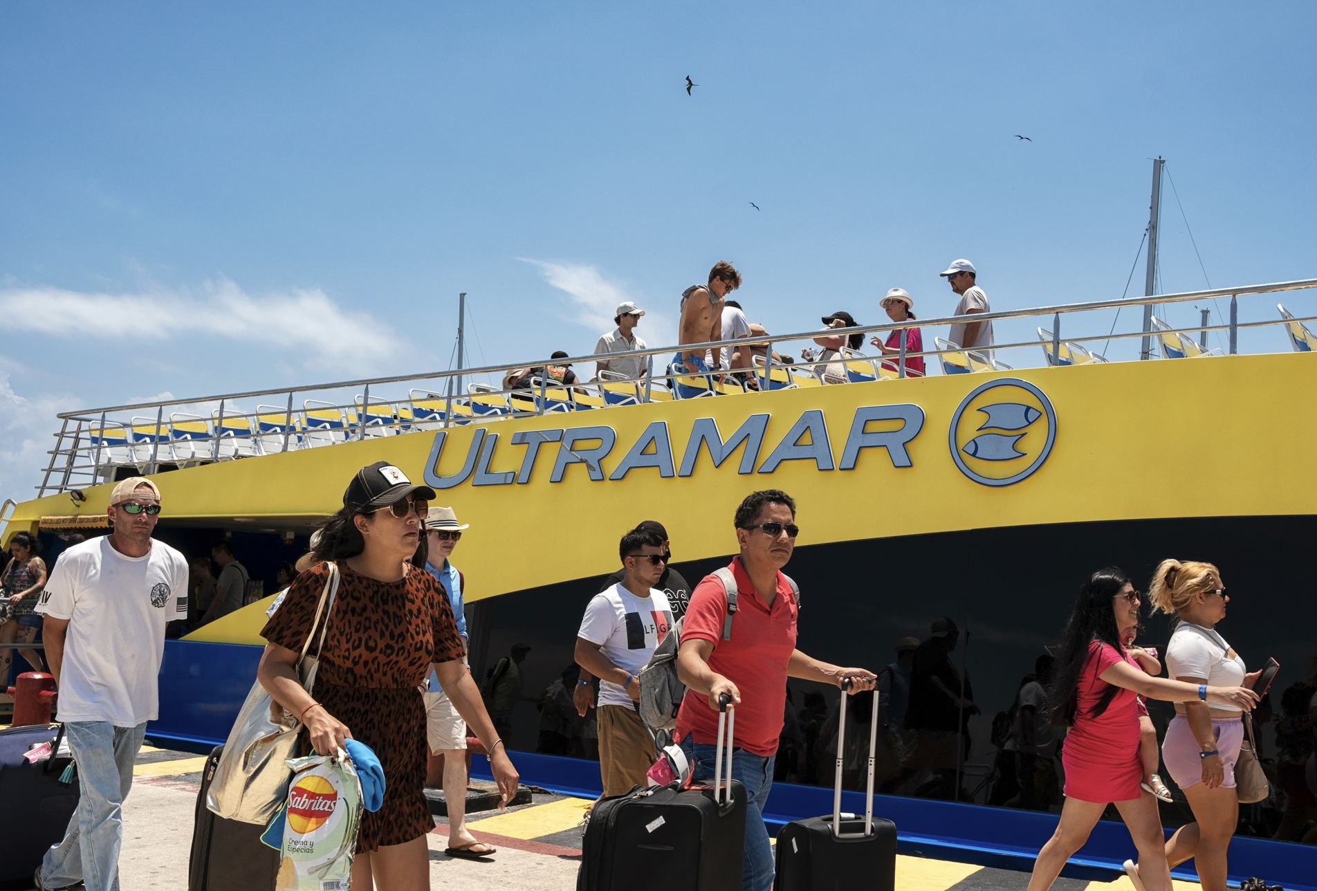 Ultramar ferry and tourists