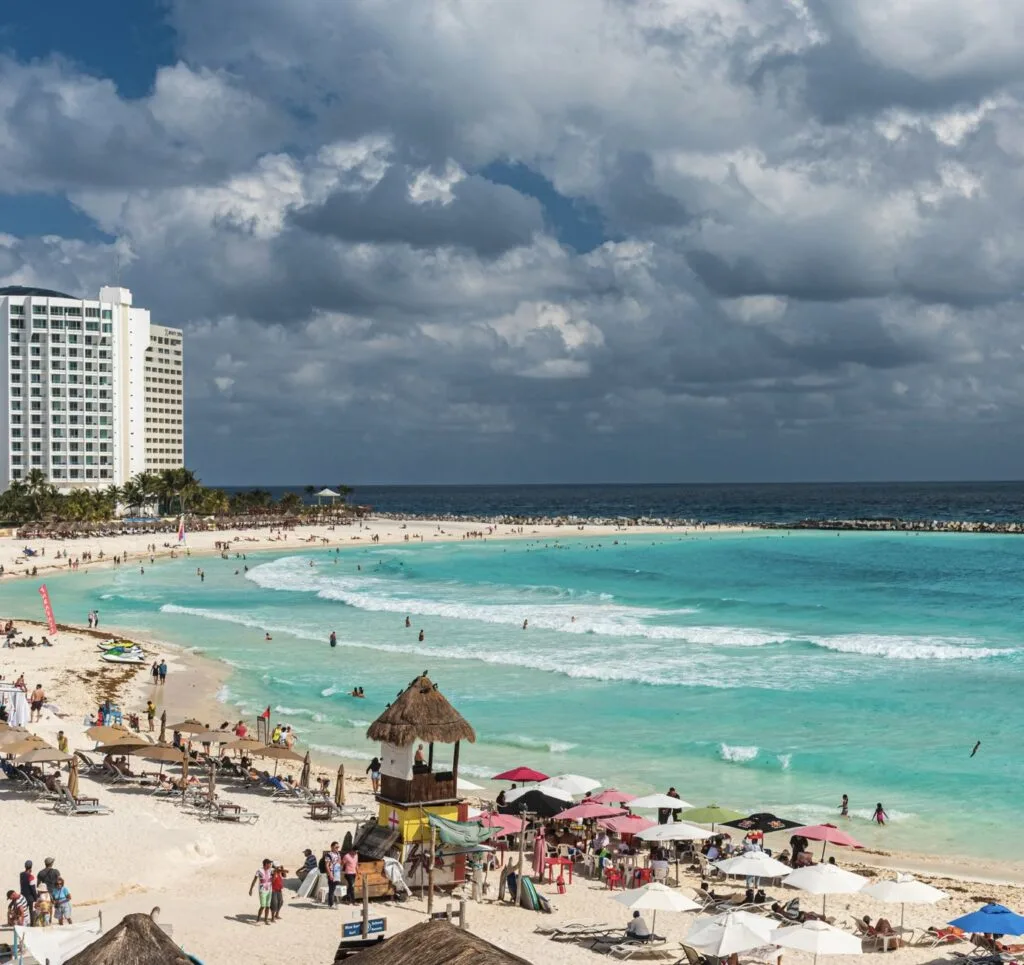 cancun busy beach tourists hotel zone