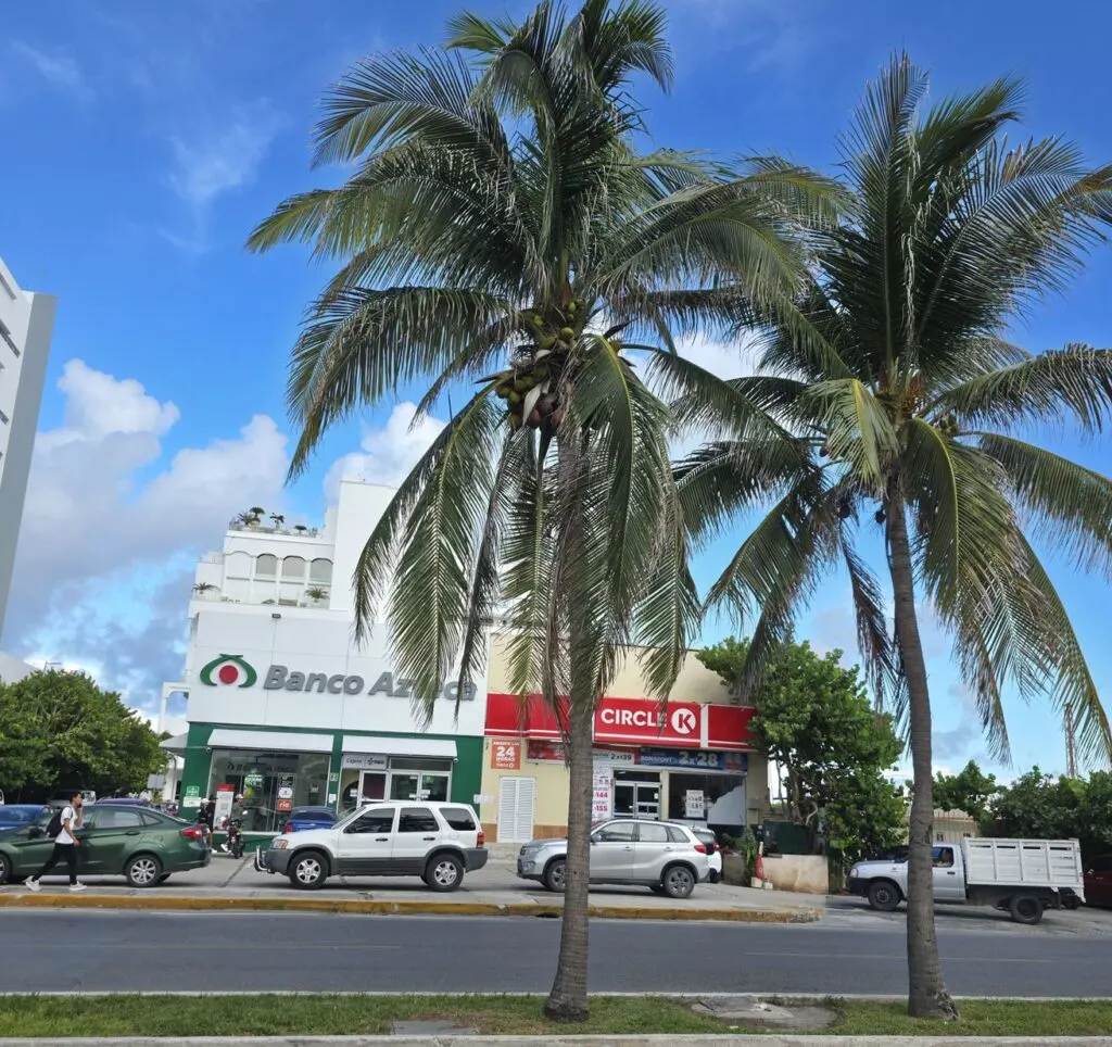 Road in Cancun Hotel Zone With Cars and Circle K