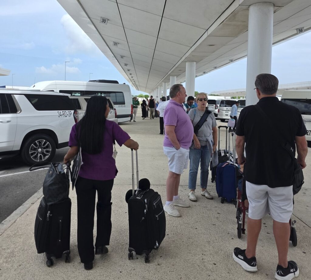 Travelers Arrive At Cancun Airport (2)