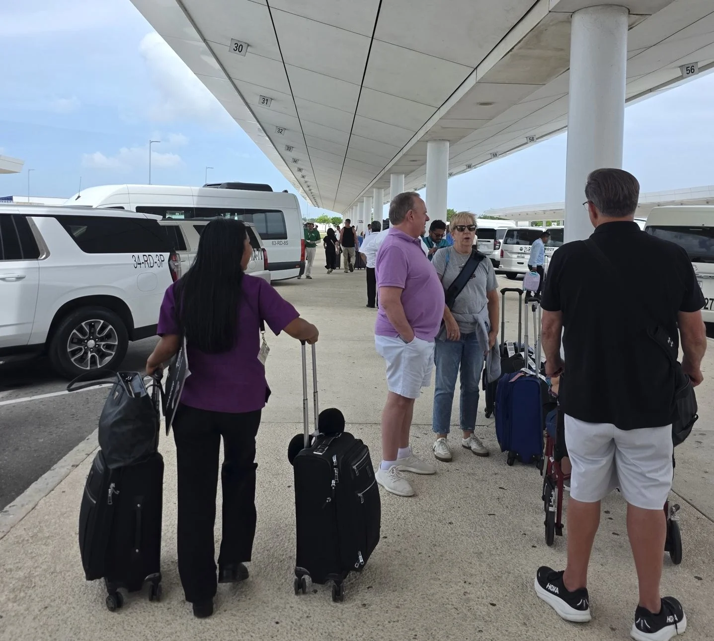 Travelers Arrive At Cancun Airport (2)