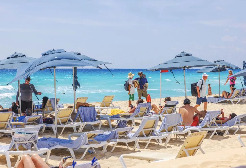 Tourists on Beach vendors