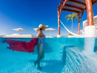 Woman in a pool in Cancun