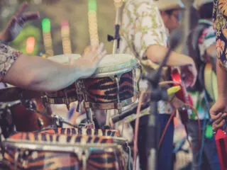 man playing percussion musical instrument reggae