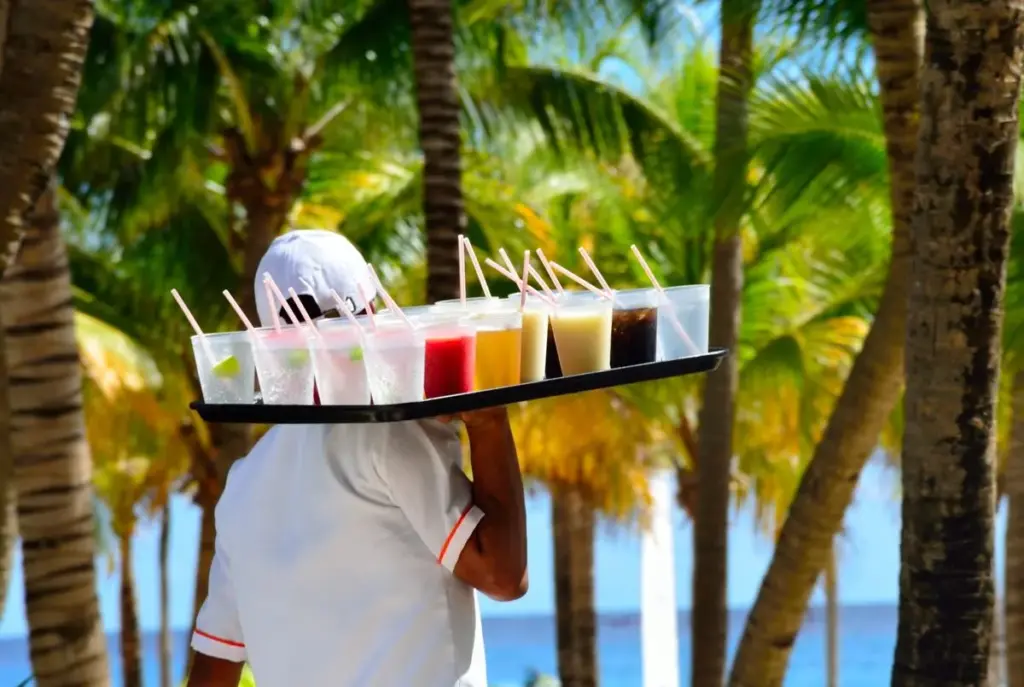 Cancun worker with drink tray