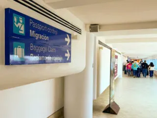 Hallway after exiting plane at Cancun Airport on the way to Customs area