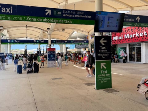 Cancun Airport exit with taxis ready