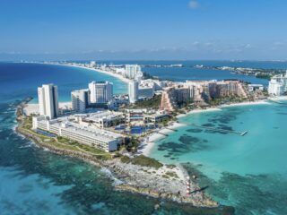 Travelers Flock To Cancun As Airport Sees 2nd Busiest Day Ever For Flights