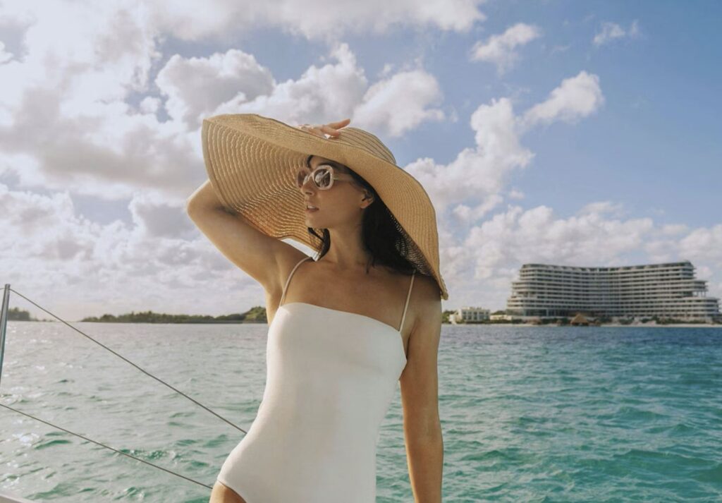 Traveler In front of St Regis Costa Mujeres