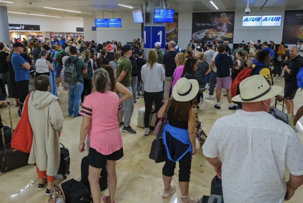 Travelers At the Cancun Airport