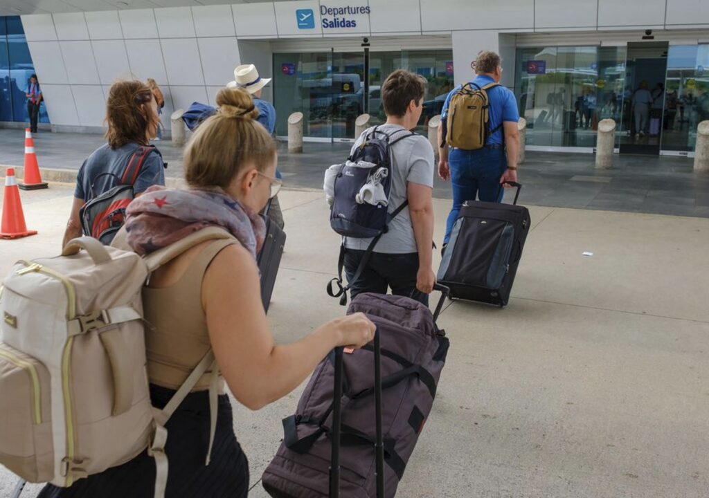 Travelers Departing Cancun