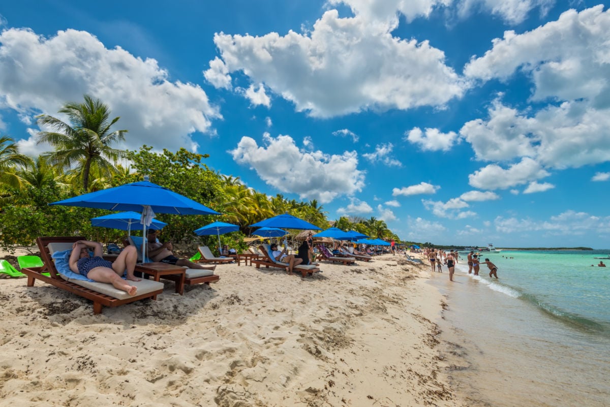 People relax on the Palancar beach in Playa Palancar, Quintana Roo, Mexico.